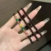 Pulsera de Tres Círculos Estilo Chino con Incrustaciones de Cristal Rojo Granada de Buena Suerte Temperamento Retro Trenzada Pulsera de Mejor Amiga