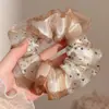 Goma para el pelo con estampado de leopardo marrón para otoño e invierno para mujer, scrunchie elegante y sofisticado para peinados de moño