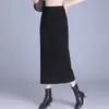 Saia Midi Temperamento para o Trabalho Feminina 2026 Outono Nova Cintura Alta Emagrecedora Redutora de Idade Saia de Cashmere Justa ao Corpo