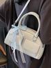 Bolso Boston Portátil de Alta Gama de Moda Dulce Estilo Francés Diseño Nicho Simple Color Sólido para Mujer