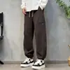 Nueva Tendencia Otoñal Marca Pantalones Deportivos Casuales con Puño en Forma de Guadaña para Hombre Sueltos Peso Pesado Caída Versátiles Deportivos Casuales Pantalones Largos
