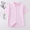 Venta al por mayor en fábrica punto uniforme JK cuello puntiagudo manga corta camisa básica blusa casual overol blanco