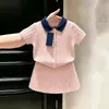 Conjunto de punto rosa dulce de verano 2026 para niñas estilo coreano, falda de punto retorcido con cuello polo de manga corta para bebé