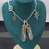 Set de Cadena de Cuerno de Plata Deseo del Ángel Estilo Takahashi Goro Pluma Plata Collar Largo Cadena para Suéter de Hombre