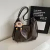 Bolso Retro de Gran Capacidad para Mujer 2026 Nuevo Bolso de Mano Mochila de Viaje de Nicho Bolso Tote de Hombro Versátil