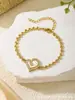 Pulsera de Cadena de Amor con Estrella de Diamante Goteado de Aceite de Temperamento de Gama Alta Transfronteriza Europea y Americana Joyería de Mano al por Mayor para Mujeres