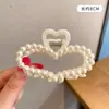 Popular pasador de perla Corea del Sur celebridad de internet ins pinza para el pelo pinza para el pelo parte trasera de la cabeza pinza de tiburón pinza lateral pinza para el pelo al por mayor