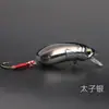 Nuevo Producto Cc35/Cc40 Monstruo Pequeño Rock Rocker Señuelo Transparente Láser con Cola Roja para Pesca