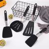 Utensilios de cocina de acero para muelles de silicona creativos transfronterizos, juego de cuatro piezas de sartén antiadherente, pala de silicona, pala elástica para bistec estilo occidental
