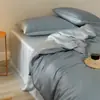 Set de Cuatro Piezas de Lujo Ligero de Alta Gama 100% Lan Jing Tencel Color Sólido Alta Densidad de Hilos Ropa de Dormir Desnuda Set de Edredón Refrigerante de Seda Helada Transpirable Refrigerante