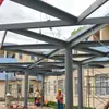 Cobertura de estrutura de aço para áreas externas, cobertura de corredor paisagístico com sombreamento para parque pequeno de formato irregular, instalação personalizada pelo fabricante