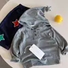 Ropa interior de manga larga para niños otoño con capucha 2026 nuevo estilo sudadera con capucha de estrellas para niños y niñas top versátil estilo coreano ropa infantil