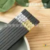 Fábrica de Hashis de Liga de Habo Venda Direta Hotel Doméstico Ouro Fortuna Ruyi Resistente a Altas Temperaturas Estilo Japonês Popular Distribuição Online