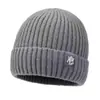 Gorro de punto liso para otoño e invierno para hombres y mujeres, gorro de lana grueso y cálido, gorro versátil con borde enrollado, gorro de punto para exteriores