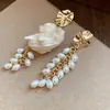 Brincos de Pérola com Pingente de Concha de Caracol Agulha de Prata Estilo Retro Francês Tribunal Brincos de Tarraxa Luxo Leve Sensação de Alto Padrão Ornamentos de Orelha Atacado