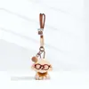 Colgante de Peluche Lindo Cachorro con Gafas Correa para Bolso Muñeco Adorno Regalo de Navidad Llavero Correa para el Cuello