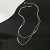 Collar de acero de titanio Golden Love para mujer, estilo frío, elegante, cadena de clavícula, diseño de nicho, cadena de collar sencilla que combina con todo.