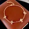 Pulseira Cruz de Zircônia Minimalista Francesa Banhada a Ouro Real, Luxo Leve, Sensação de Alto Padrão, Moderna, Joia Exquisita e Versátil