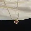 Conjunto de Joias de Amor Vermelho de Nicho Colar de Aço Titânio Masculino Versátil High-end Corrente de Colar de Luxo Leve Brincos Femininos com Pino de Prata