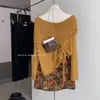 Traje Elegante de Gama Alta para Mujer 2025 Otoño Nuevo Cardigan de Punto Plegado con Solapa Falda Estampada Conjunto de Dos Piezas Moderno