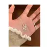 Versão Coreana do Colar Carrossel Picado de Gelo do Ano Zodiacal para Mulheres, Corrente de Clavícula com Design de Luxo Leve da Moda