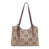 Bolso de mano nuevo de comercio exterior con estampado de rombos, un bolso de mano simple y versátil que se puede llevar debajo del brazo, un bolso tote práctico y elegante para ir al trabajo, diseñado para mujeres
