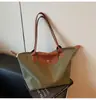 Nova Bolsa de Ombro de Tecido Oxford Moda e Versátil Grande Capacidade Impermeável Dumpling Mamãe Feminina de Nylon para Viagem Bolsa de Mão
