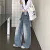 Jeans retro americanos de mezclilla lavada azul con dobladillo curvo desgastado para mujeres petite, corte holgado, adelgazantes, pantalones rectos de pierna ancha hasta el suelo