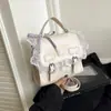 Estilo de Viaje Diario Bolso Pequeño Cuadrado para Mujer de PU Color Sólido Modelo Nuevo Verano 2026 Bolso Versátil Simple de Hombro y Cruzado
