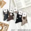 Calcetines Deportivos de Caña Alta para Mujer, Calcetines de Dibujos Animados de Alta Elasticidad, Calcetines de Algodón Peinado Todo en Uno Nai Fu Kelu Li Venta al por Mayor