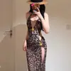 Vestido largo negro hueco ajustado favorecedor oculta la figura escote en V profundo sexy de alta gama traje de baño de tres piezas vacación en isla aguas termales