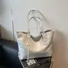 Bolsa tote de gran capacidad, nuevo modelo 2026, con un tacto sofisticado y lujoso, hecha de cuero suave, una bolsa de hombro grande adecuada para el trabajo y los desplazamientos, y puede albergar un portátil