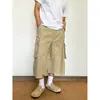 Shorts cargo holgados de pierna ancha, color liso, multibolsillos, marca de moda, casual, moderno, elegante, genial, versátil, de siete octavos