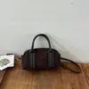 Bolso retro de mujer estilo Boston con forma de concha, nueva colección 2026, moderno bolso de hombro/bandolera de gamuza para ventas transfronterizas