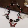 Collar Cruzado Nuevo Dulce y Fresco Multicapa de Perlas Negras Rosa Mariposa Lujo Ligero Nicho Personalizado Borla Cadena para Clavícula