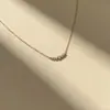 Novo colar de diamante com rosto sorridente para mulheres, requintado e discreto, com um toque de luxo leve, nicho, de alta qualidade, design simples e versátil