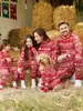 Europa y Estados Unidos transfronterizos nuevo traje familiar de Navidad para padres e hijos pijamas con estampado de dibujos animados ropa de estar ropa de casa se puede diseñar