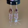 Pendientes de borla con forma de gota de agua tachonados de diamantes, sensación de lujo ligero y alta gama, pendientes versátiles de moda vintage para mujer