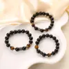 Pulsera de cuentas de cristal de ágata negra estilo ins europeo y americano, pulsera tejida a mano con piedra de ojo de tigre, joyería de mano todo en uno para mujer, venta al por mayor