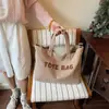 Comércio exterior por atacado moda europeia e americana letra 2026 nova bolsa de ombro retrô grande capacidade bolsa tote para trabalho e deslocamento