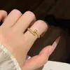Nuevo bestseller transfronterizo: anillo de latón bañado en oro para mujer, anillo abierto versátil, exquisitamente incrustado con circonia, accesorio de mano de diamantes completos