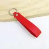 Chaveiro de PU de cor sólida transfronteiriço, cordão de mão de couro de cor doce criativo, chaveiro de carro simples para homens, atacado