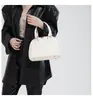 Bolsa Pequena para Mulheres 2026 Nova Moda Retrô Bolsa de Mão Formato Concha Bolsa Simples Casual de Ombro Transversal Bolsa Feminina Tendência