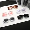 Gafas de sol de moda 2026 con montura cuadrada para mujer Estilo Ins moderno Gafas de sol transparentes rosas Anti-UV Personalizadas Modernas