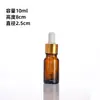 Botella de vidrio de color para aceite esencial con gotero de punta de plástico graduada, botella a prueba de luz para sérum, botella de empaque para sérum, botella dispensadora
