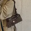 Bolso tipo baguette retro a rayas y lunares para mujer, nuevo estilo 2026, con hebilla de cinturón, bolso de axila, adecuado para el trabajo y los desplazamientos, de mano o de hombro
