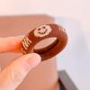 Explosiones de otoño e invierno coreanas anillo para toalla de rayas blancas y negras con cara sonriente anillo para el pelo de niños al por mayor pelo grueso pelo suave accesorios para el pelo