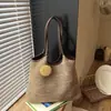 Bolsa versátil de verano para vacaciones casuales transfronteriza 2026, tejida, para ir al trabajo, de moda, versátil, simple, bandolera, para debajo del brazo, tote