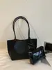 Bolsa de mano tejida de gran capacidad transfronteriza, moderna, casual, versátil, adecuada para ir al trabajo, bolso de hombro de moda de nicho, bolso de axila elegante