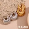 Pendientes Populares de Nicho de Moda Europeos y Americanos Acero Inoxidable Chapado en Oro de 18K Pendientes Huecos Exagerados con Patrón de Cuerno para Mujer